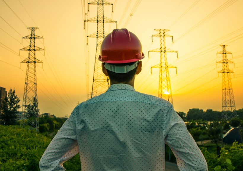 Engineer looking at the horizon